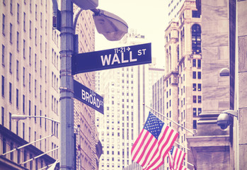 Wall Street and Broad Street signs, color toning applied, New York City, USA.