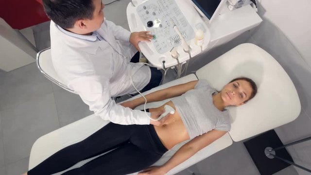 High angle of ultrasound examination of the abdominal cavity 