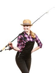 Happy woman in sun hat holding fishing rod