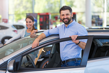 Young couple buying a car
