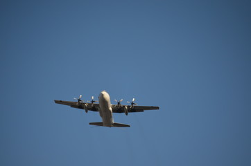 Military Four Helix Aircraft Flying Upwards