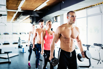 Naklejka premium Group of people have workout in gym