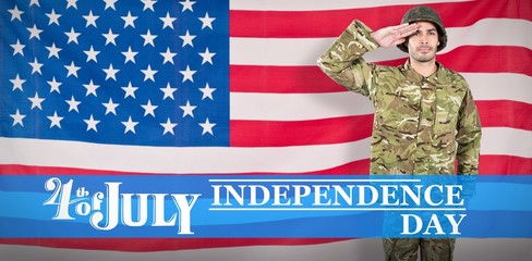 Composite image of portrait of confident soldier giving salute