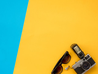 Summer Flat Lay Photo with blue and yellow background.