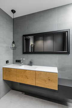 Gray bathroom with countertop basin