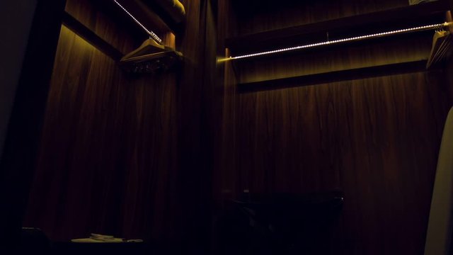 Close up of wooden cabinets in dressing room