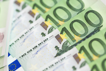 Close-up of 100 Euro banknotes. Shallow dof