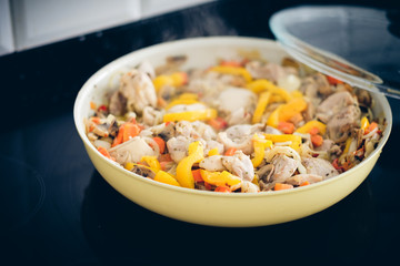 Chicken stew with mushrooms and vegetables