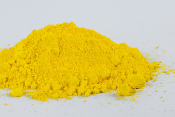 Cadmium Yellow pigment on a white background