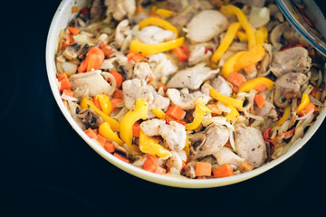 Chicken stew with mushrooms and vegetables