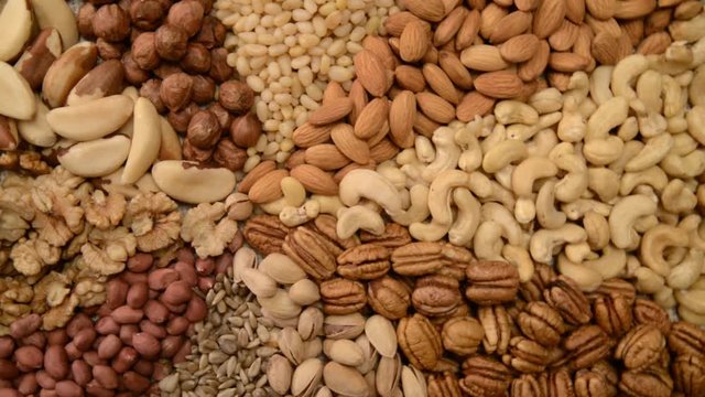 Nuts mix in a canvas bag in table.