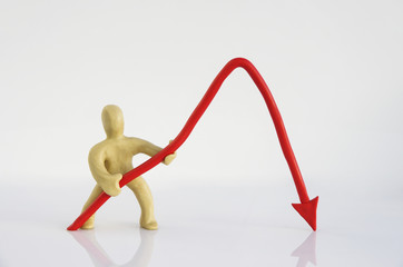 White man holding a red negative graph