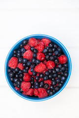 Ripe beautiful raspberries and blackberries
