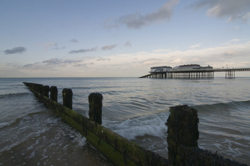 Groyne with tide coming in with Cromer Pier in the background