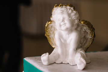 Children's Cupid with wings of an angel