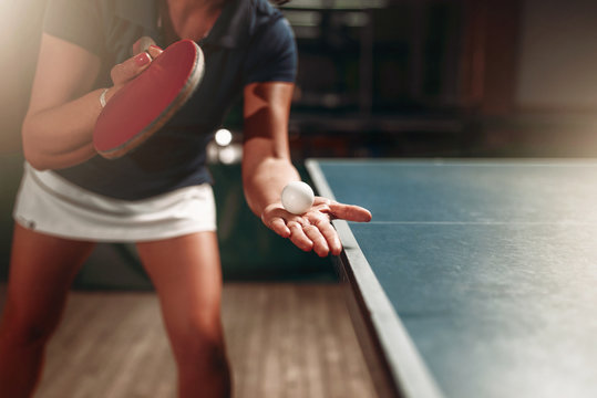 Table tennis, female player with racket and ball