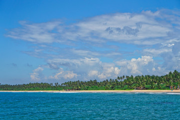 Indian Ocean surface summer wave background. Exotic water landscape with clouds on horizon. tropical water paradise. Maldives nature relax. Travel island resort. Untouched beach in Sri Lanka