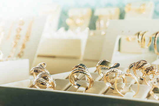 Jewelry In The Shop Window, Gold Rings With Diamonds, Copy Space