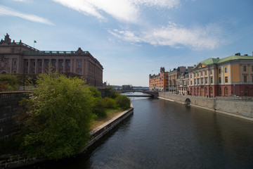 Fototapeta premium Water channel in Stockholm. The parliament building on the left side.