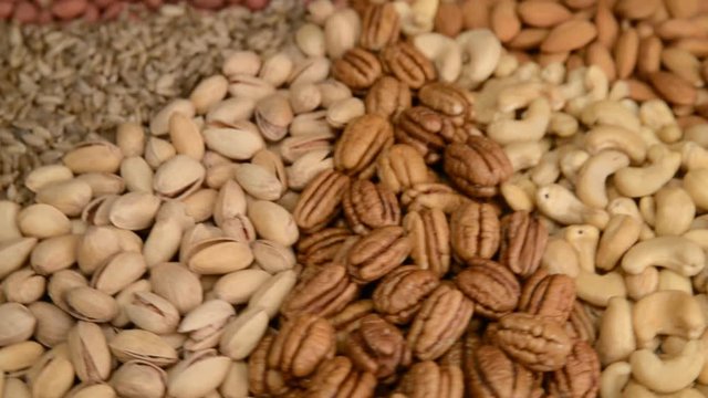 Nuts mix in a canvas bag in table.