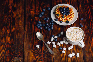 Obraz na płótnie Canvas Waffles with Blueberry and Cup of Coffee.