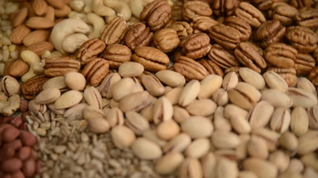 Nuts mix in a canvas bag in table.