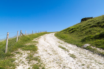 Fototapeta na wymiar Chalk pathway leading up a hill