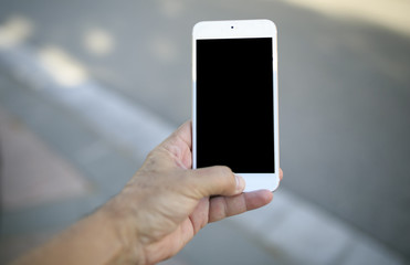 Mobile phone in a hand