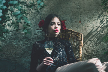 adorable girl with stylish red lips holding wine glass