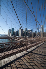 Downtown Manhattan viewed through Brooklyn Bridge suspension cables