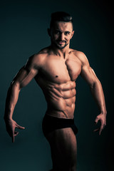 Fototapeta na wymiar sexy man with muscular body in underwear pants