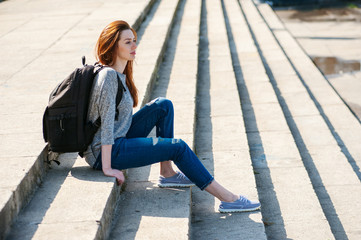 girl sitting on stone steps 08