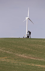 Fototapeta na wymiar Wind Turbine and Oil Pump