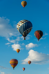 Balloons in the clouds