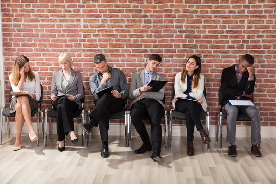 Diverse Businesspeople Waiting For Job Interview