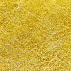 Shiny yellow leaf gold foil texture background