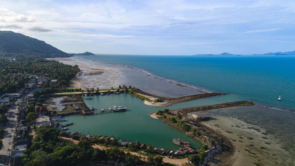 Aerial view of fisherman village marina on the tropical island 