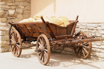 Medieval transport - a cart with bags (without horses)