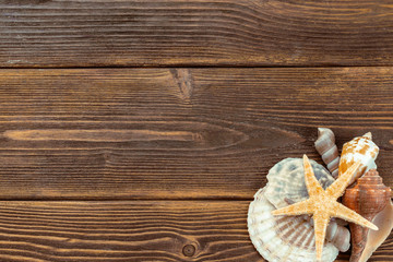 Fototapeta premium Beach accessories on wooden board