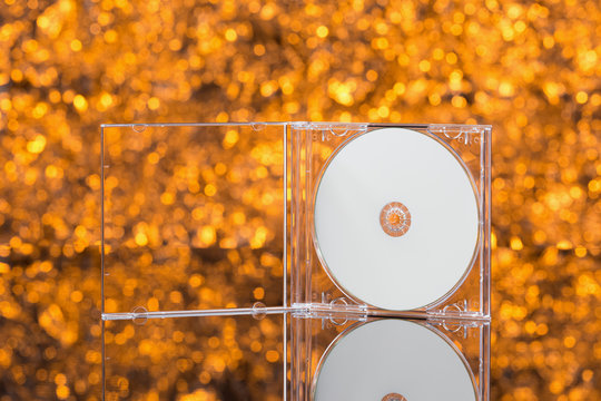 CD / DVD box on orange background