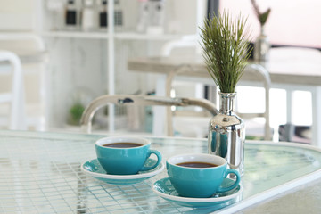 Hot americano - Closeup a cup of coffee on concrete table background, Morning Breakfast.