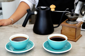 Hot americano - Closeup a cup of coffee on concrete table background, Morning Breakfast.