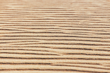 Lines in the sand of a beach, close up