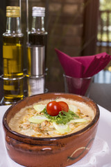 Casserole with roasted eggplants stuffed with minced meat. Delicious tradicional meal served at the restaurant. Roasted eggplants stuffed with minced meat and baked with tomatoes and cheese.