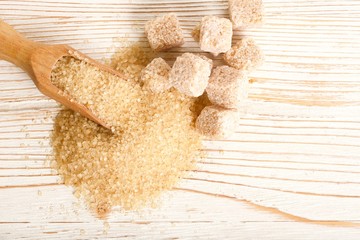 brown sugar on wooden background