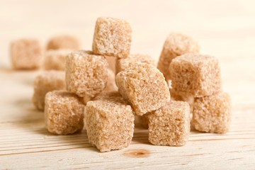 brown sugar on wooden background