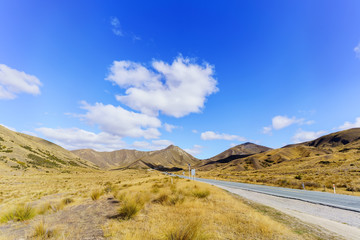 Lindis Pass Scenic Reserve is the highest point on the South Island's state highway network of New Zealand offering mountain and tussock grassland scenery