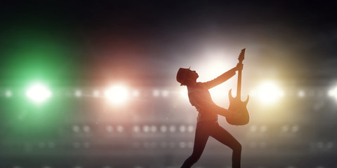 Rock girl with guitar. Mixed media