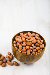 Peanut on a  wooden table