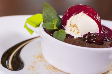 Beautiful dessert at the restaurant. Petit gateau dessert. Hot chocolate pudding with vanilla ice cream ball.
